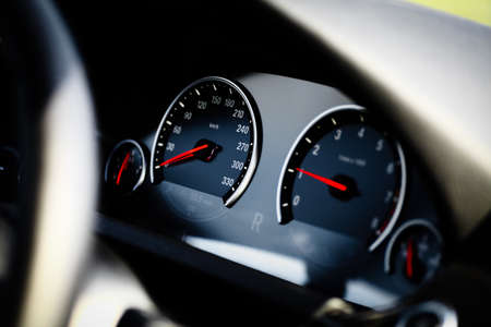 Close up shot of a speedometer in a car
