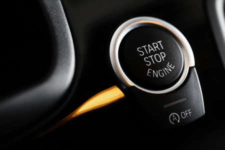 Detail on the start button in a car