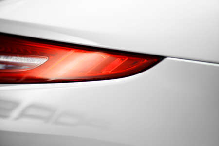 Detail on the rear light of a white carの写真素材