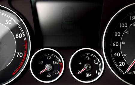 Color detail with the gauges on the dashboard of a car