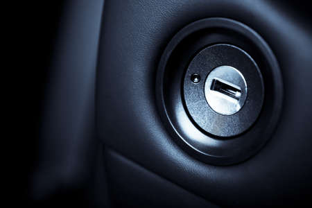 Close up shot of the ignition keyhole in a carの写真素材