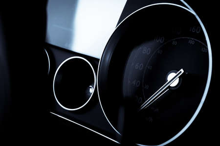 Close up shot of a speedometer in a car