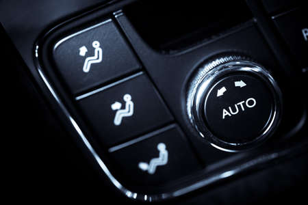 Color detail with the air conditioning button inside a carの写真素材
