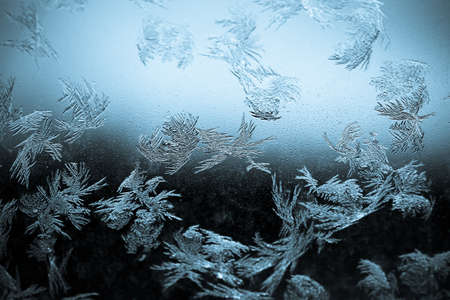 Close-up shot of some icy-flowers on a window