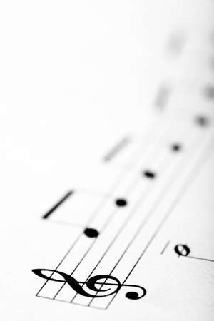 Detail of a music sheet with the G clefの写真素材