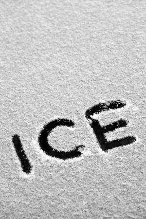 The word "ICE" is written in the snowの写真素材