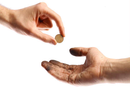 A clean hand offering a coin to a dirty hand.