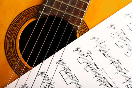 A classical guitar and a music sheet.のeditorial素材