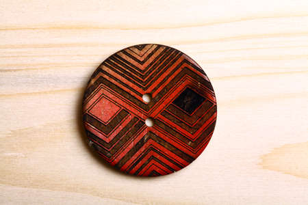 a wooden button.