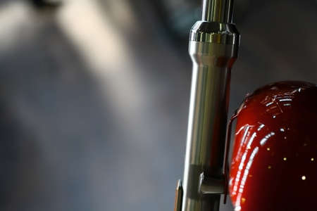 Close up shot of the front suspension of a motrcycle.