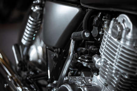 Detail with the kick-start pedal of a motorcycle.