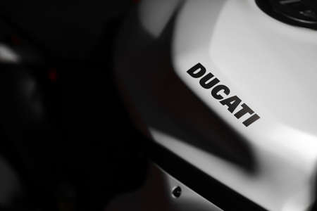 Bucharest, Romania - April 4, 2014: The tank of a Ducati motorcycle is displayed at a motorcycle show in Bucharest, Romania. Ducati Motor Holding S.p.A. is an Italian company that designs and manufactures motorcycles.のeditorial素材