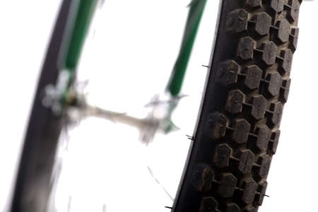 Detail of a bicycle tire isolated on white.