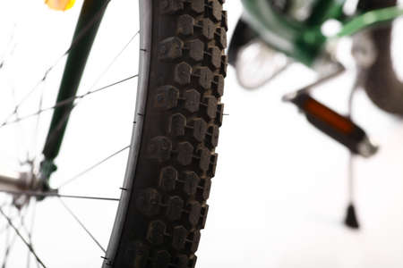 Color detail of the wheel of a bicycle, with spokes.