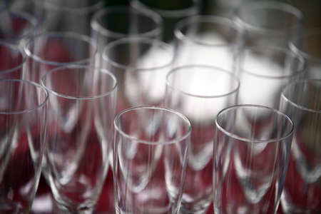 Color detail of some empty champagne glasses.の写真素材