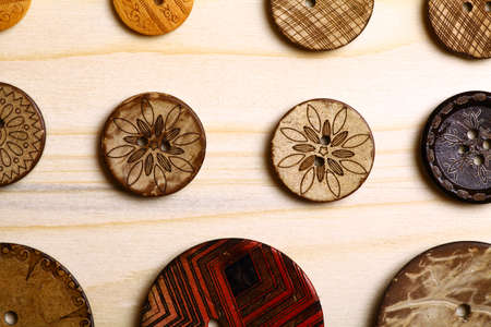Close up color shot of some wooden buttons.