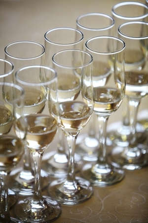 Color detail of some empty champagne glasses.の写真素材