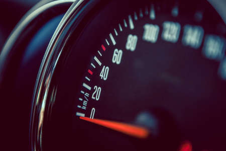 Close up shot of a speedometer in a car