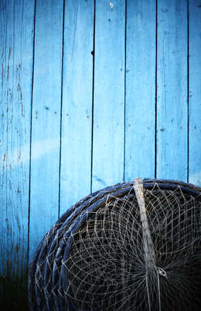 Color detail of a fishing net left to dry.の写真素材