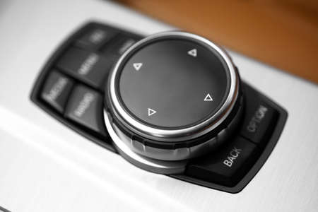 Detail of some black buttons in a car.の写真素材