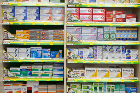 Bucharest, Romania - October 14, 2014: Color shot of some shelves filled with medicine in a pharmacy in Bucharest, Romania.のeditorial素材