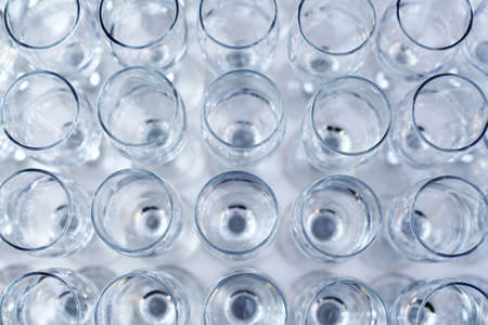 Color detail of some empty champagne glasses.の写真素材