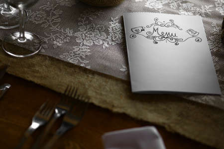 Close up shot of a menu on a table.の写真素材
