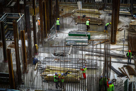 Bucharest, Romania - October 9, 2014: General view of some workers on a construction site in Bucharest, Romania.のeditorial素材