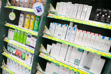 Bucharest, Romania - October 14, 2014: Color shot of some shelves filled with medicine in a pharmacy in Bucharest, Romania.のeditorial素材