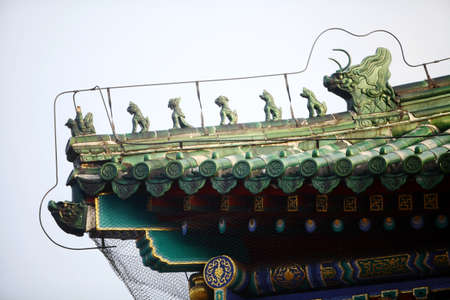 Color horizontal picture of some traditional Chinese roof tops.