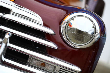 Color detail on the headlight of a vintage car