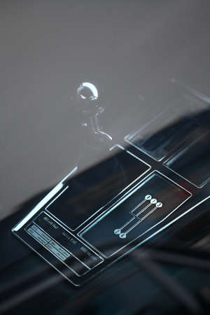 Detail on a automatic gear shifter in a vintage car.の写真素材