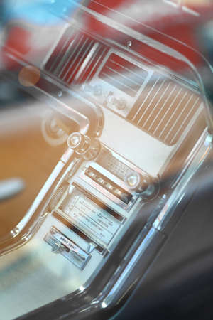 Color vertical shot of the dashboard of a vintage car.の写真素材