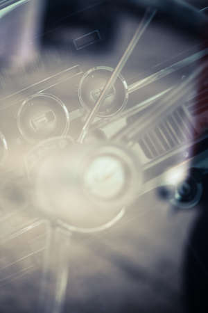 Color vertical shot of the dashboard of a vintage car.の写真素材