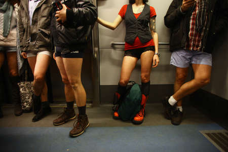 BUCHAREST, ROMANIA - January 11, 2015: People wearing no pants participate in the 'No Pants Subway Ride' in Bucharest, Romania. No Pants Subway Ride is an annual global event started in New York, USA in 2002.のeditorial素材
