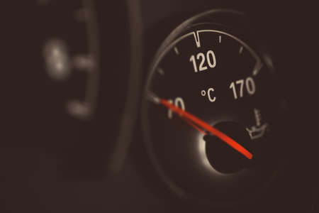 Coolant temperature gauge on a car's dashboard.