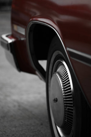 Color vertical shot of a vintage car's wheel.の写真素材