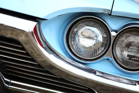 Color detail on the headlight of a vintage car.の写真素材