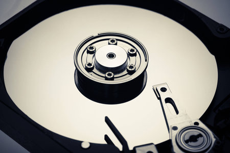 Color picture with details from inside a computer hard drive.の写真素材