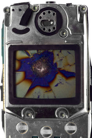 Studio shot of a damaged LCD screed of a mobile phone.