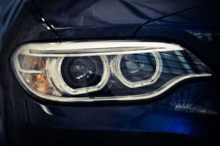 Detail on one of the LED headlights of a car.の写真素材