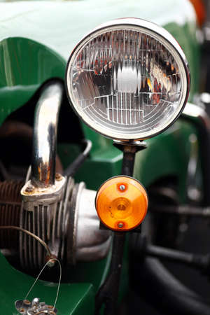 Color detail on the headlight of a vintage car.の写真素材