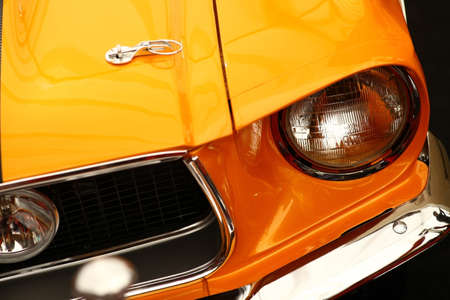 Color detail on the headlight of a vintage car.の写真素材
