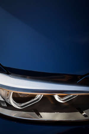 Detail on one of the LED headlights of a car.の写真素材
