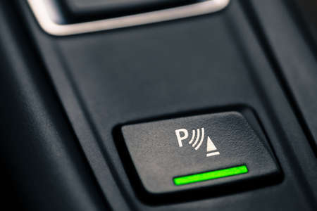 Close-up shot with the detail of a parking brake in a car.の写真素材