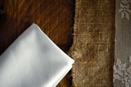 Color picture of a white napkin on a table.の写真素材