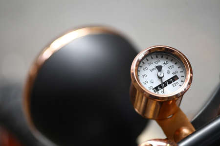 Color detail with the speedometer of a motorcycle.