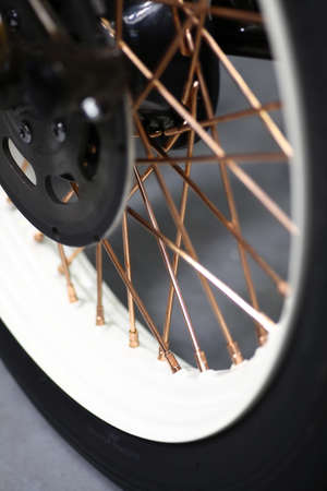 Close up shot of the spokes of a motorcycle wheel.の写真素材