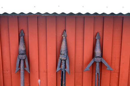 Color image of some rusty harpoons, in a row.の写真素材