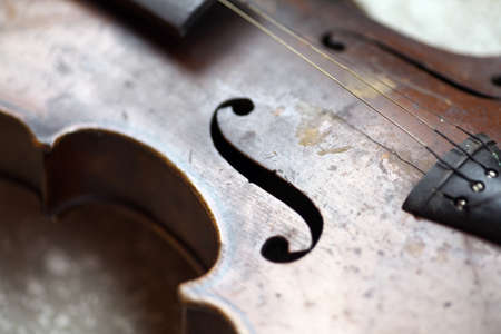 Color detail of a used, old violin.の写真素材
